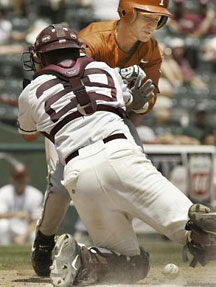 [Photo of Robby 
Hudson colliding with A&M catcher]